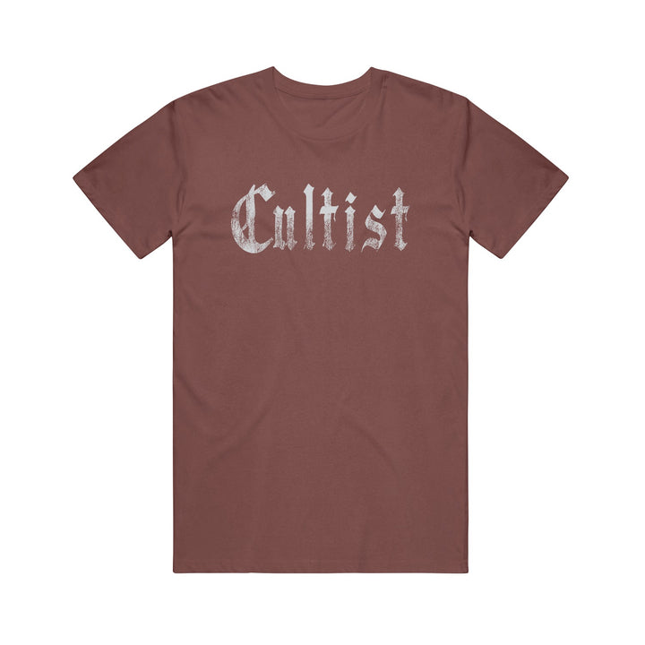 A brown Cultist Comfort Colors t-shirt featuring "Cultist" in large, distressed white Gothic-style letters across the chest, displayed flat on a white background.