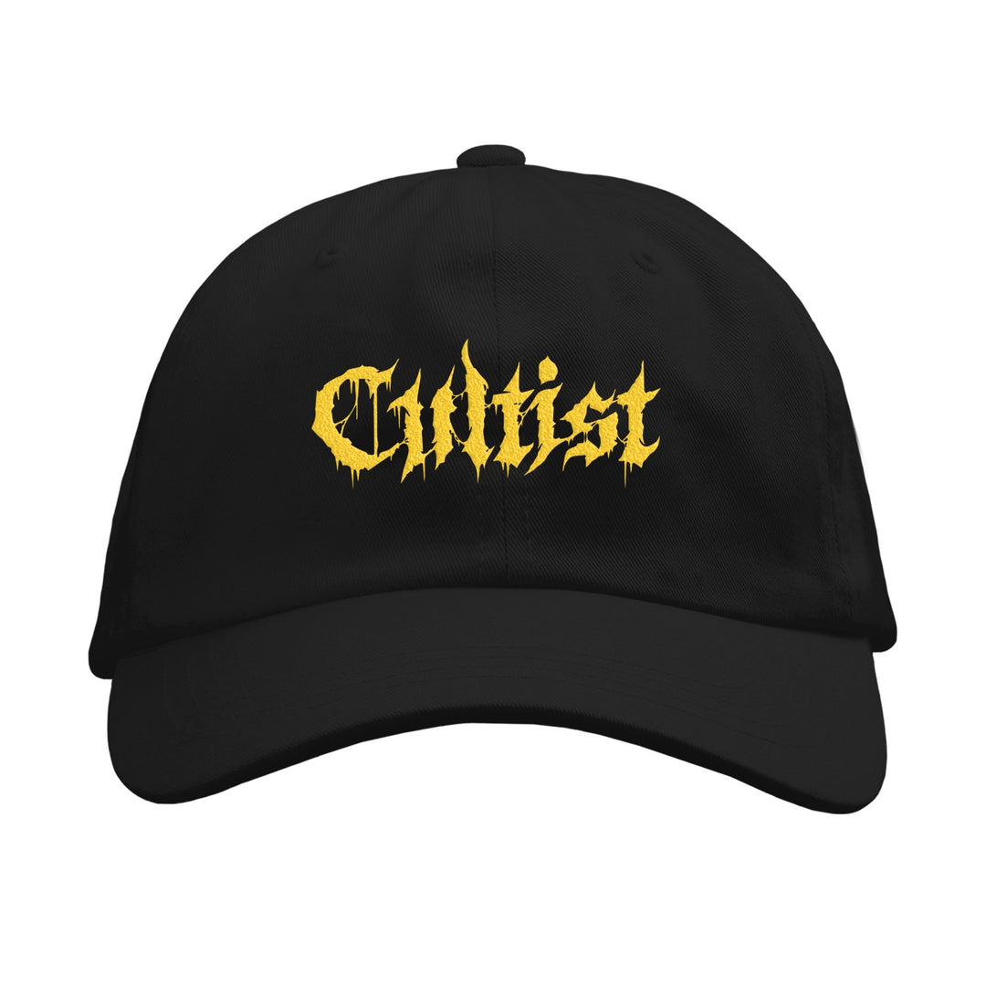 The Cultist black dad hat showcases the brand name in bold, yellow, gothic-style lettering—a striking logo accessory for any collection.