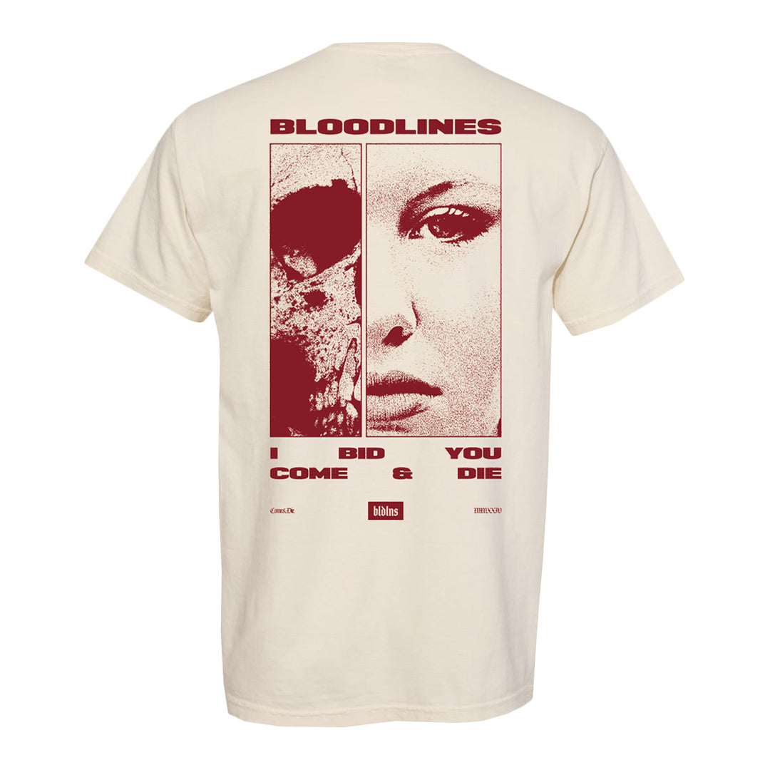 Back of a cream, garment-dyed Comfort Colors T-shirt made from soft ring-spun cotton with bold red graphics: a skull on the left, a woman’s face on the right. Text reads BLOODLINES. I BID YOU COME & DIE. Logos and small text appear at the bottom.