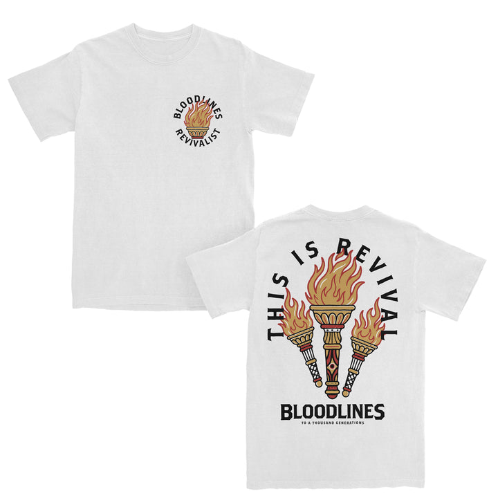 White t-shirt crafted from 100% cotton with a flaming torch graphic and REVIVALIST BLOODLINES on the front. The back features three flaming torches and the text THIS IS REVIVAL and BLOODLINES in bold black letters. Made by Bella + Canvas, this heavyweight t-shirt delivers both comfort and durability.