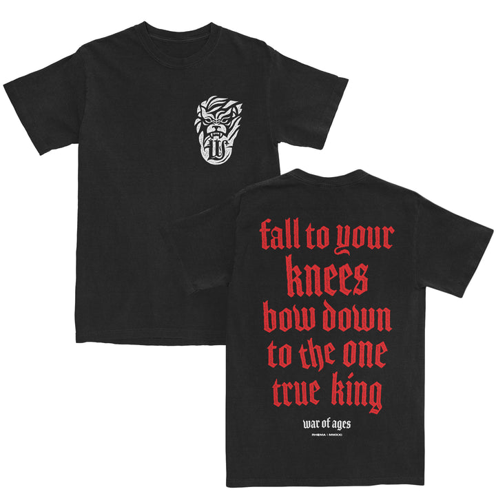Black T-shirt with a white, tribal-style mask on the front left chest. Crafted from 100% cotton for ultimate comfort, this relaxed fit Alstyle T-Shirt features large red text on the back: fall to your knees bow down to the one true king above small white text: war of ages.