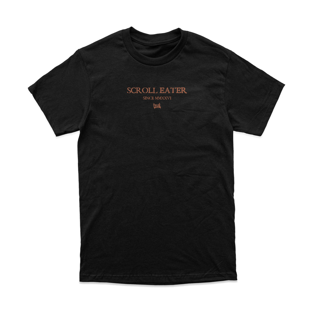 Relaxed fit, heavyweight black t-shirt with SCROLL EATER and SINCE MMXXVI printed in copper text on the chest.