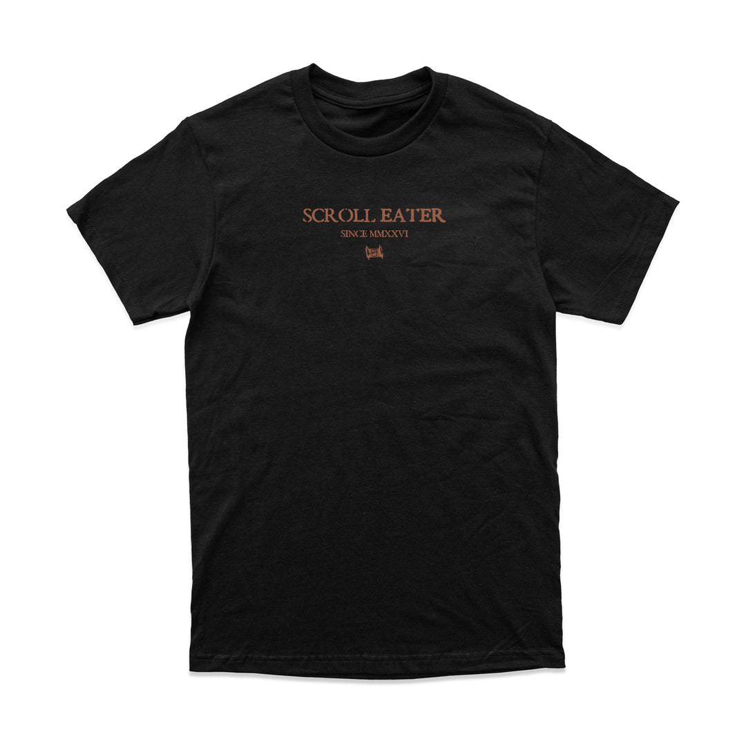 Relaxed fit, heavyweight black t-shirt with SCROLL EATER and SINCE MMXXVI printed in copper text on the chest.