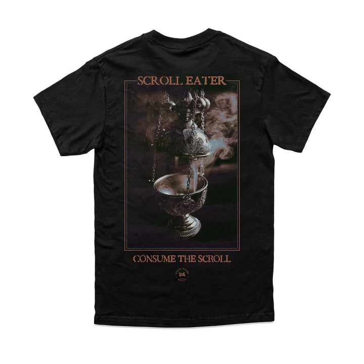 Relaxed fit black t-shirt featuring a back graphic of an ornate metal incense burner, with the text SCROLL EATER above and CONSUME THE SCROLL below.