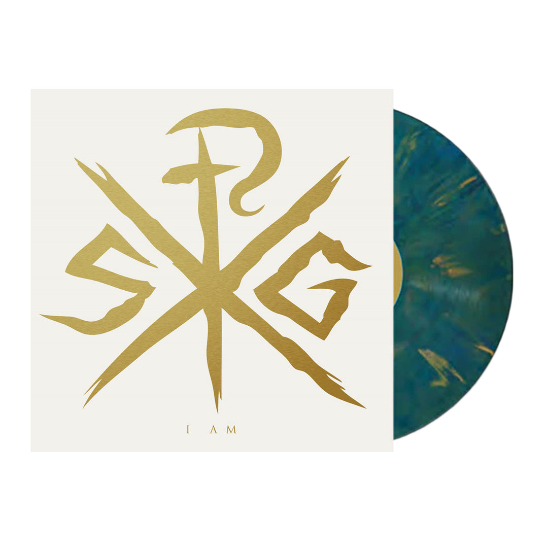 Album cover for the Sleeping Giant Royal Kingdom LP features a gold stylized sword and SKG initials on white, with "I AM" below the design. A blue and gold marbled vinyl album is partially visible.