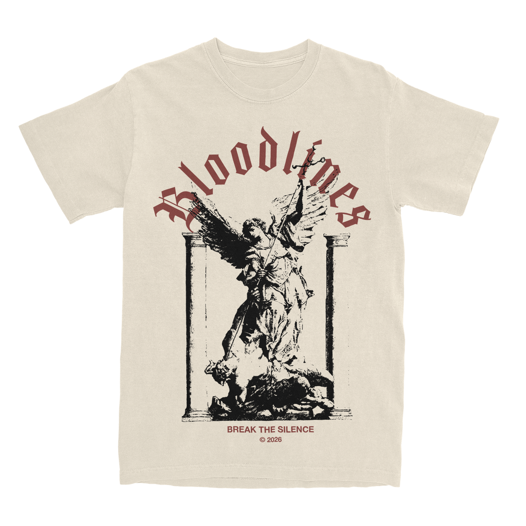 Beige Bella Canvas printed t-shirt featuring Bloodlines in red gothic font above a striking black-and-white angel statue. Below the design, Break the Silence © 2026 is written in small black text.