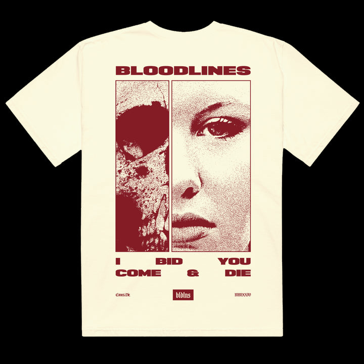 The Bloodlines Comfort Colors T-shirt is cream-colored and features a split skull and womans face graphic, BLOODLINES text above, I BID YOU COME & DIE below, plus small logos at the bottom.