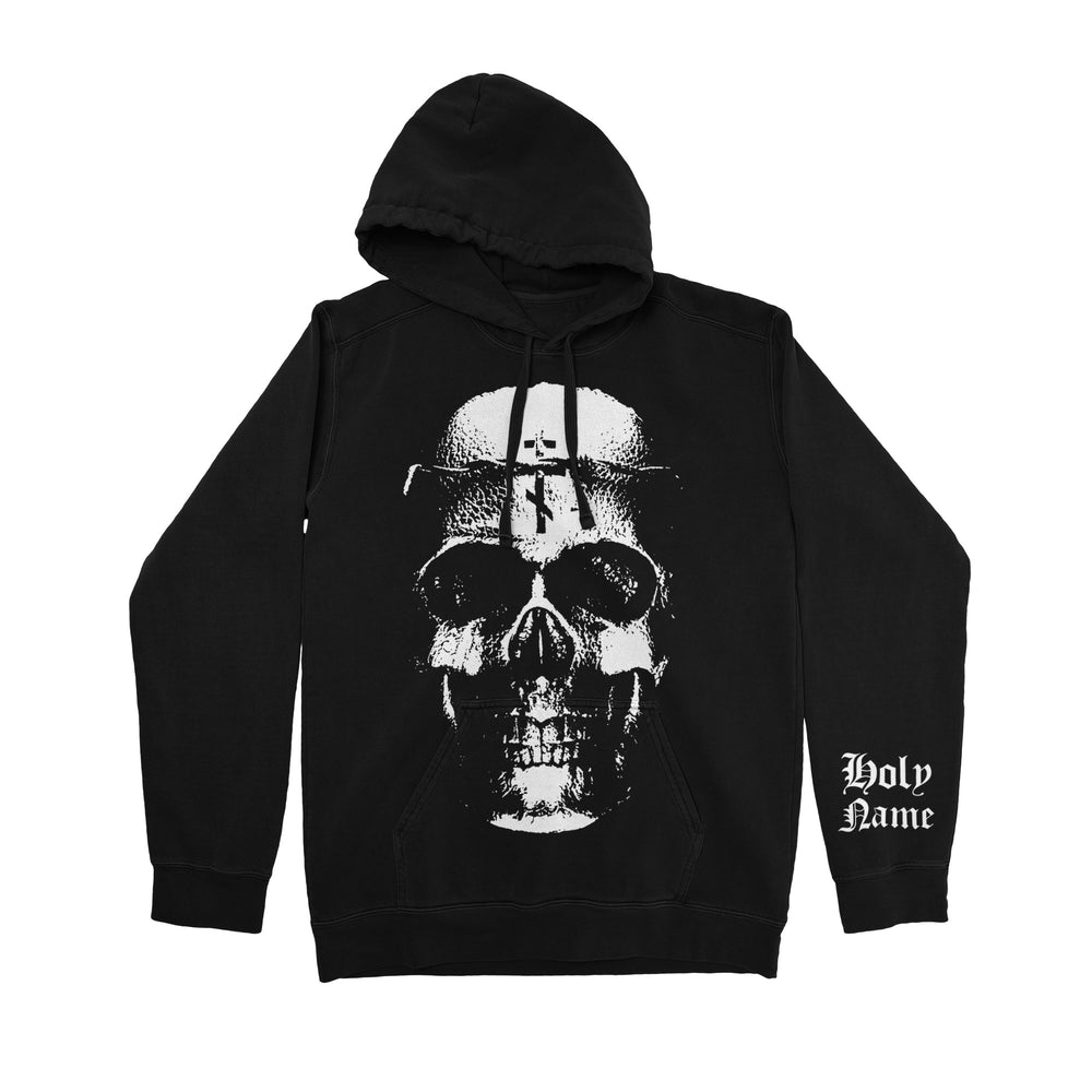 HolyName black ring-spun cotton hoodie with a bold white skull graphic on the front and Holy Name in white Gothic script on the left sleeve.